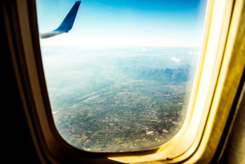 beige plane window view beige plane window view