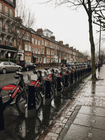 Bicycles on Bike Racks Beside Road Bicycles on Bike Racks Beside Road