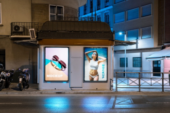 Billboard mockup in city at night Free Psd