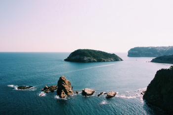 Bird's Eye View Photography Of Islet Bird's Eye View Photography Of Islet