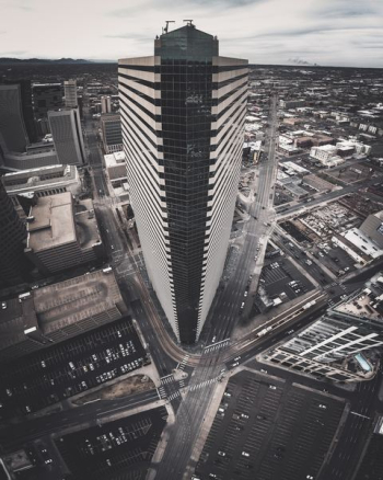bird's-eye view photography of concrete high-rise building bird's-eye view photography of concrete high-rise building