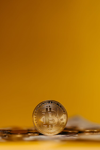 Bitcoin on Yellow Background Bitcoin on Yellow Background
