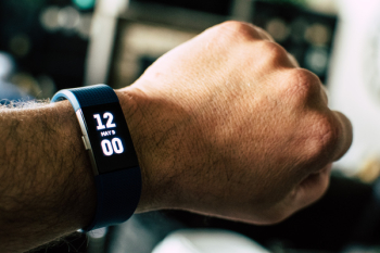 Black Activity Tracker Watch Reading 12:00