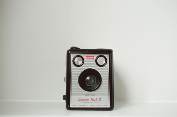 black and gray Kodak camera black and gray Kodak camera