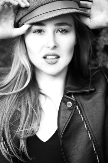 Black and White Photo of a Woman Wearing Leather Jacket Black and White Photo of a Woman Wearing Leather Jacket