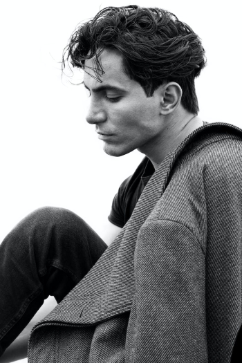 Black and White Picture of a Young Handsome Man in a Coat Black and White Picture of a Young Handsome Man in a Coat