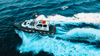 Black and White Pilot Tug Boat on Ocean Black and White Pilot Tug Boat on Ocean