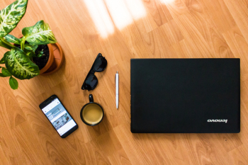 Black Android Smartphone Near Black Coffee Cup
