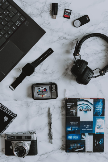 Black Apple Watch and Wireless Headphones Black Apple Watch and Wireless Headphones