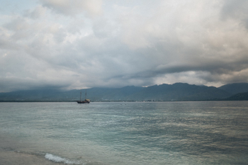 Black Boat on Body of Water Black Boat on Body of Water