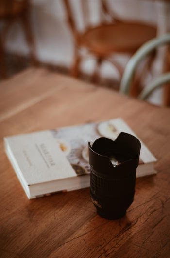 Black Camera Zoom Lens on Table