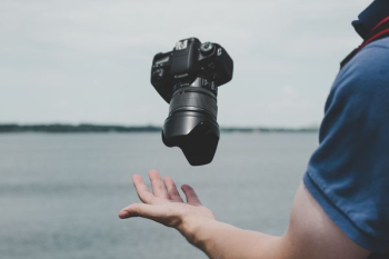 black Canon DSLR camera black Canon DSLR camera