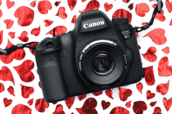 Black Canon Eos 6d Camera on Red and White Surface
