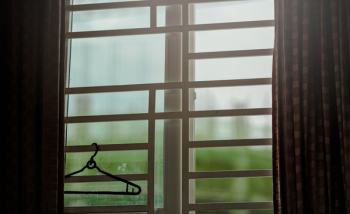 Black Clothes Hanger Hanged on Window Black Clothes Hanger Hanged on Window