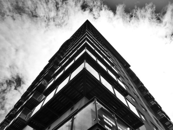 Black Concrete Building Under Sky Black Concrete Building Under Sky