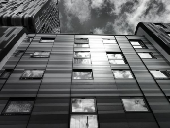 Black Concrete Building Under Sky Black Concrete Building Under Sky