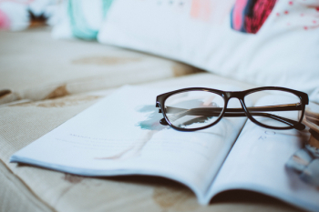 Black Framed Eyeglasses On Paper Black Framed Eyeglasses On Paper