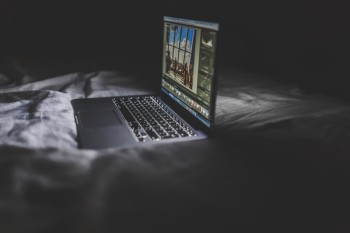 Black Laptop Computer on Black Textile Black Laptop Computer on Black Textile