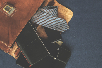 Black Leather Wallet Near the Necktie Black Leather Wallet Near the Necktie