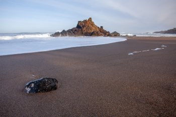 Black Rock on Sandy Beach Black Rock on Sandy Beach