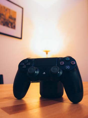 Black Sony Ps4 Dualshock 4 On Tabletop Black Sony Ps4 Dualshock 4 On Tabletop