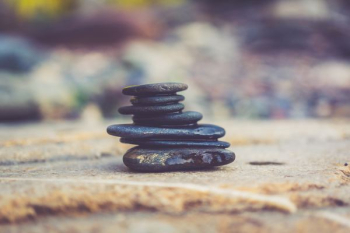 black stone arrangement in closeup photography black stone arrangement in closeup photography
