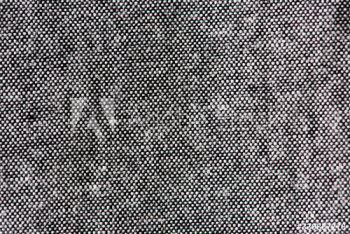Black with white spots fabric background