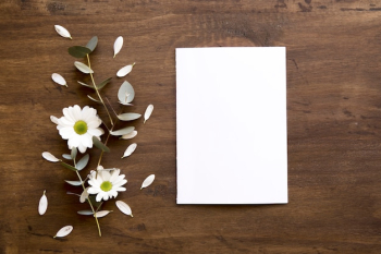 Blank paper mockup with flowers