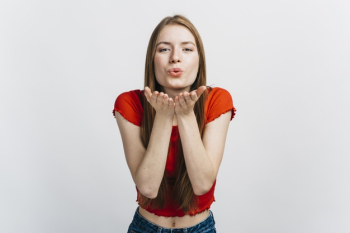 Blonde woman blowing kisses Free Photo Blonde woman blowing kisses Free Photo