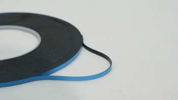 Blue and Black Adhesive Tape on White Background Blue and Black Adhesive Tape on White Background