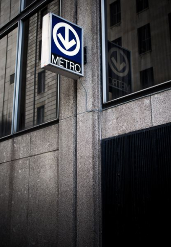 blue and white Metro signage blue and white Metro signage