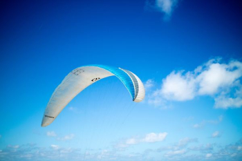 blue and white paragliding blue and white paragliding