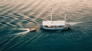 Blue Boat on Ocean