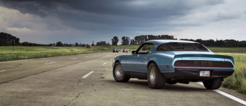 Blue Coupe on Brown Concrete Road Blue Coupe on Brown Concrete Road