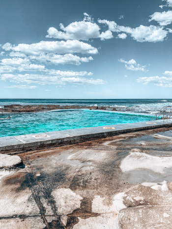 Blue Sea Under a Cloudy Sky