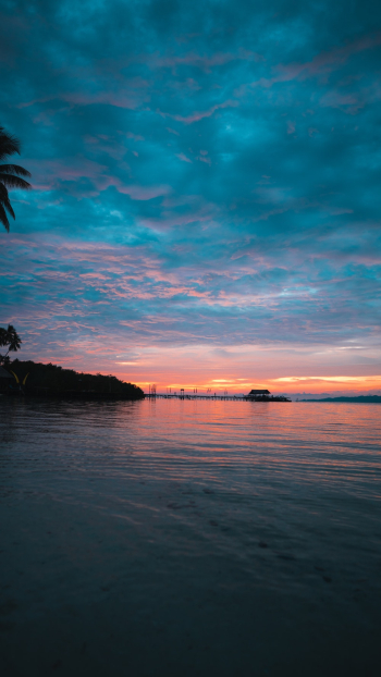 Blue Sea Under Cloudy Sky during Golden Hour Blue Sea Under Cloudy Sky during Golden Hour