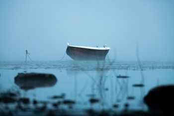 Boat Anchored in Water Boat Anchored in Water