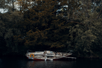 Boat sitting abandoned and broken. Boat sitting abandoned and broken.