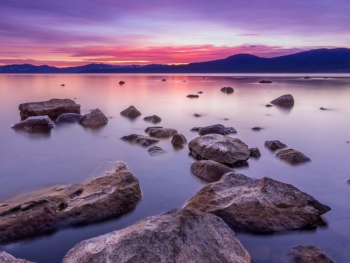 body of water during sunset body of water during sunset