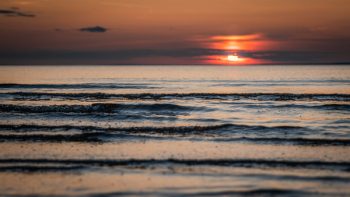 Body Of Water During Sunset Body Of Water During Sunset