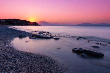 body of water during sunset body of water during sunset