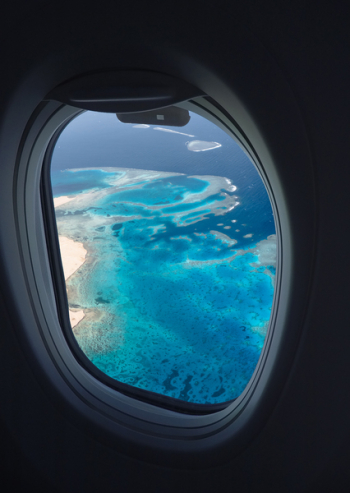 Body of Water View from Airplane Window Body of Water View from Airplane Window