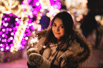 Bokeh Photography of Woman in Brown Parka Jacket Bokeh Photography of Woman in Brown Parka Jacket