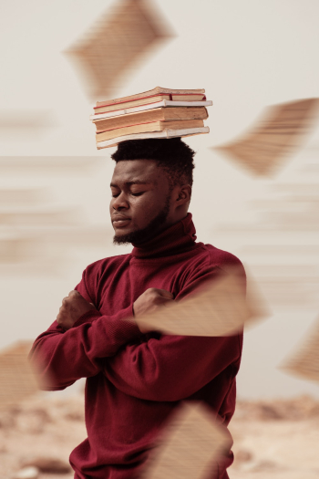 Books on Man's Head Books on Man's Head