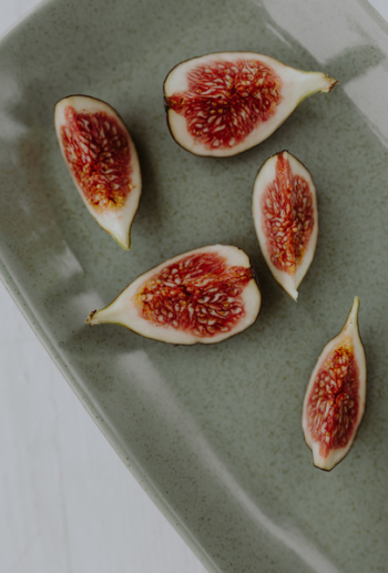 Bowl of crunchy granola and figs Bowl of crunchy granola and figs