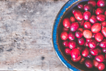 Bowl of Red Round Fruits