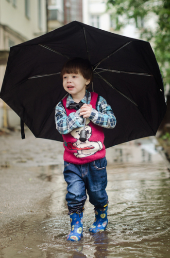 Boy Holding Black Umbrella Boy Holding Black Umbrella