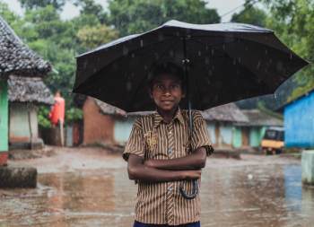 Boy Holding Black Umbrella Boy Holding Black Umbrella