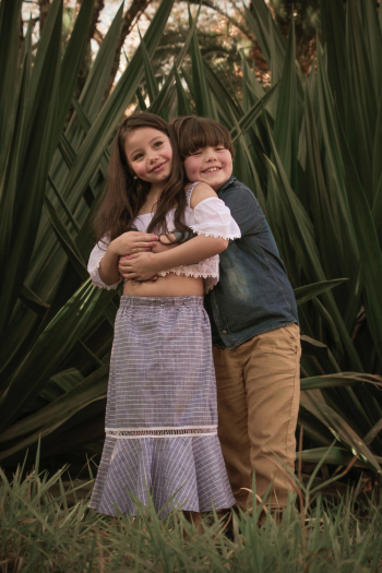 Boy Hugging Girl 