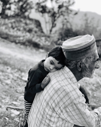 Boy Leaning Beside An Old Man Boy Leaning Beside An Old Man